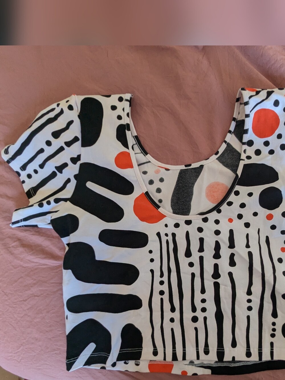 Women’s White Crop Top with Black Abstract Print and Orange Accents